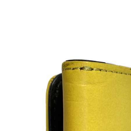  DIESEL ディーゼル 長財布 AMAZONITE PLUS イエロー x シルバー x ブラック スタッズ 牛革 レザー