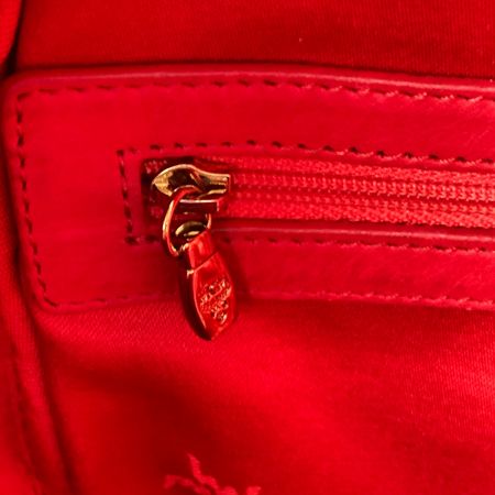  MCM エムシーエム ロゴグラム スタッズ ヴィセトス リュック サーモンピンク