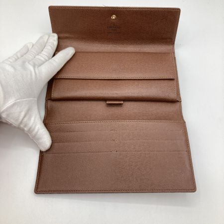  LOUIS VUITTON ルイヴィトン モノグラム ポル卜フォイユ インタ一ナショナル 3つ折り長財布 M61217 ブラウン