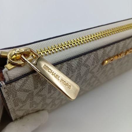  MICHAEL KORS マイケルコース ジェット セット トラベル シグネチャー ラージ スリー クォーター Lジップウォレット 35F8GTVZ3B バニラ