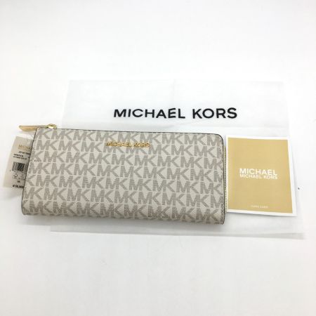  MICHAEL KORS マイケルコース JET SET TRAVEL ウォレット ラージ - MKシグネチャー 35F8GTVZ3B アイボリー