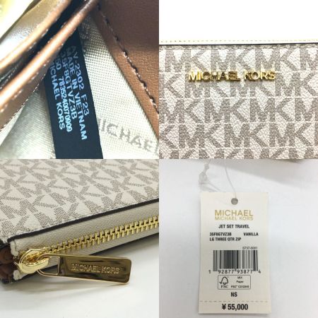  MICHAEL KORS マイケルコース JET SET TRAVEL ウォレット ラージ - MKシグネチャー 35F8GTVZ3B アイボリー