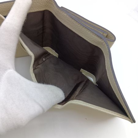  GUCCI グッチ エンボスロゴ ミニウォレット 3つ折り財布 731694 アイボリー