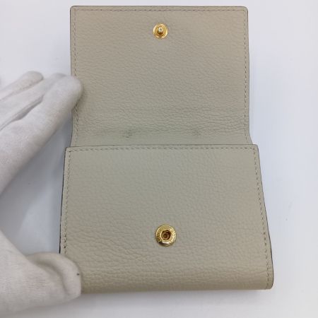  GUCCI グッチ エンボスロゴ ミニウォレット 3つ折り財布 731694 アイボリー