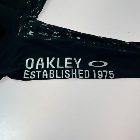 OAKLEY オークリー  ジップパーカー 総柄 FOA404679　サイズⅬ