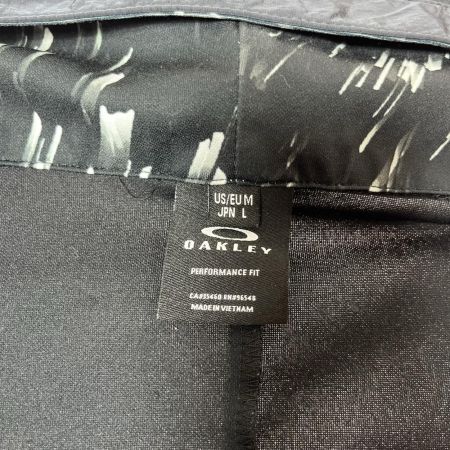 OAKLEY オークリー  ジップパーカー 総柄 FOA404679　サイズⅬ