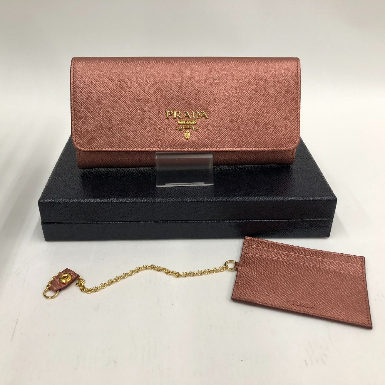 中古】 PRADA プラダ 2つ折り長財布 サフィアーノ 1M1132 ピンク ...