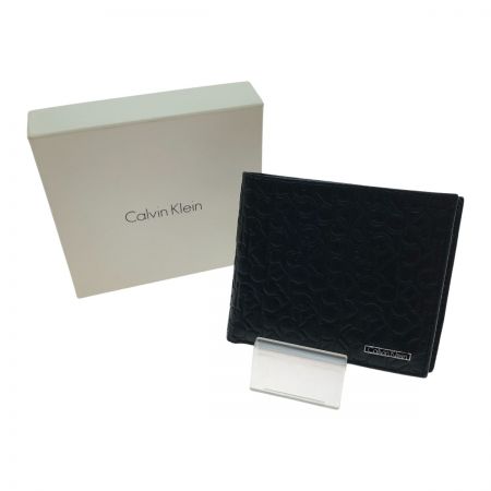  Calvin Klein カルバンクライン 二つ折り財布 ロゴ 型押し 74285 ブラック