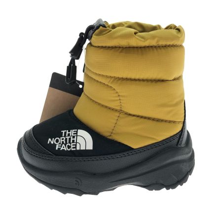  THE NORTH FACE ザノースフェイス スノーブーツ ヌプシ ブーティ VI 14cm NFJ52288 ゴールド×ブラック