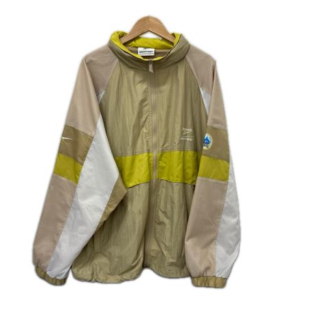 REEBOK リーボック ジャケット ナイロンジャケット SIZE XL ドラゴンクエスト 40周年 RB00160 ベージュ系 x イエロー x ホワイト