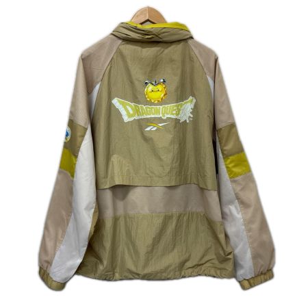 REEBOK リーボック ジャケット ナイロンジャケット SIZE XL ドラゴンクエスト 40周年 RB00160 ベージュ系 x イエロー x ホワイト