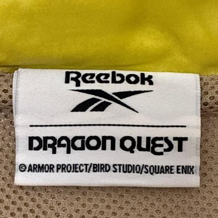 REEBOK リーボック ジャケット ナイロンジャケット SIZE XL ドラゴンクエスト 40周年 RB00160 ベージュ系 x イエロー x ホワイト