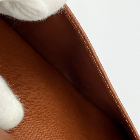  LOUIS VUITTON ルイヴィトン 長財布 ポルトシェキエカルトクレディ モノグラム 角ソリ 下部分少し破け M62225 ブラウン系