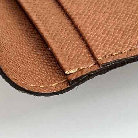  LOUIS VUITTON ルイヴィトン 長財布 ポルトシェキエカルトクレディ モノグラム 角ソリ 下部分少し破け M62225 ブラウン系