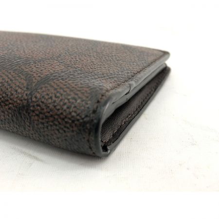  COACH コーチ メンズ 二つ折り長財布 ミッドナイトシグネチャー アウトレット  74939 ブラウン
