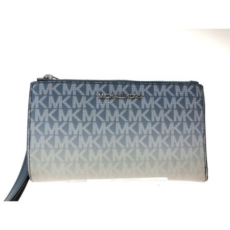  MICHAEL KORS マイケルコース ユニセックス 二つ折り長財布 トラベル ジェットセット シグネチャー ブルー