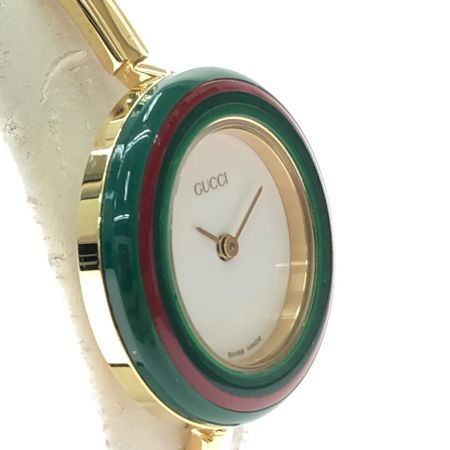  GUCCI グッチ レディース腕時計 クオーツ チェンジベゼル バングル 金メッキ　ゴールド 11/12.2 ホワイト