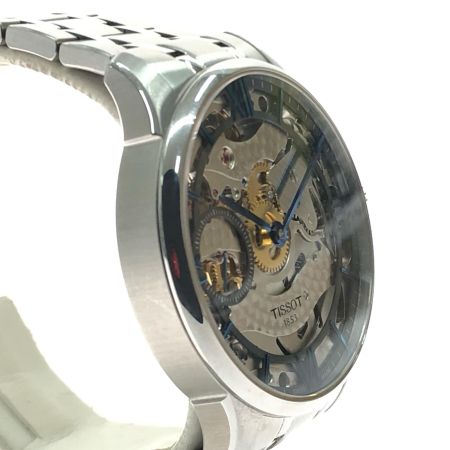  TISSOT ティソ メンズ腕時計 手巻き シュマンドトゥレル スケルトン WJHU8LBAZ/T099405A