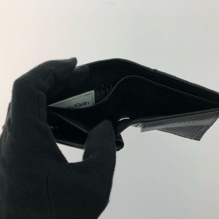  Calvin Klein カルバンクライン メンズ 二つ折り財布 エンボススリムバイフォールドウォレット 4D1063G ブラック