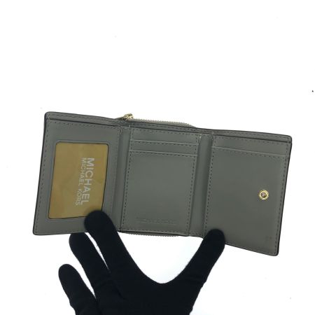  MICHAEL KORS マイケルコース レディース 三つ折り財布 コンパクトウォレット シグネチャー 35H9GTVZ5B ホワイト