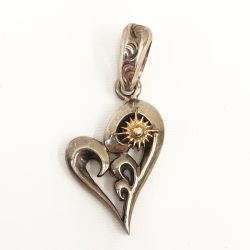 〇〇 ARIZONA FREEDOM アリゾナフリーダム ペンダントトップ K太陽神 抜き唐草ハートトップ T-114a Bランク