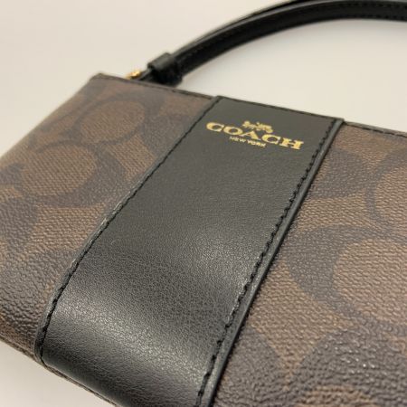  COACH コーチ シグネチャー コーナー ジップ リストレット コスメポーチ  F58035 ブラウン