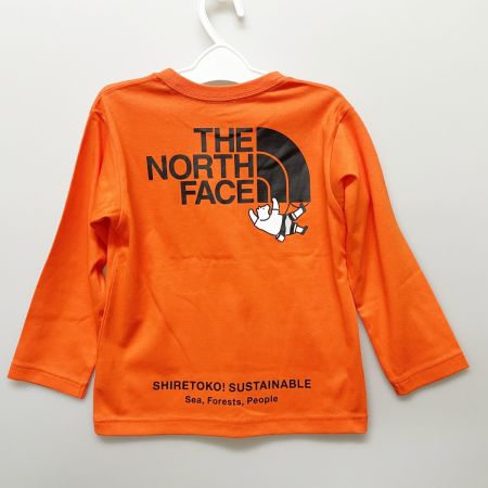  THE NORTH FACE ザノースフェイス キッズ 長袖Tシャツ 知床トコさん 100cm NTJ82332ST オレンジ