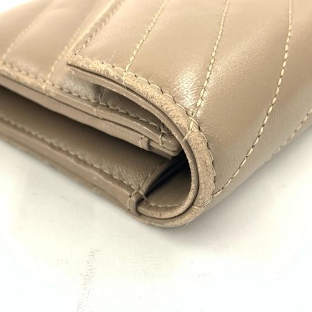 Yves Saint Laurent イブサンローラン カサンドラ マトラッセ ラージ フラップウォレット 長財布 372264 ベージュ