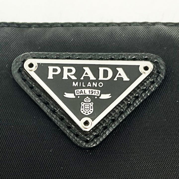 中古】 PRADA プラダ コスメポーチ ブラック 小物入れ ロゴアップリケ テスート ナイロン レディース｜総合リサイクルショップ  なんでもリサイクルビッグバン オンラインストア