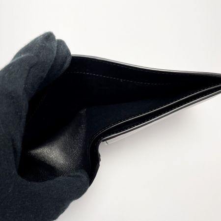  SAINT LAURENT(Yves Saint Laurent) TINY 610193 ブラック 2つ折り財布 レザー メンズ 箱・布袋有