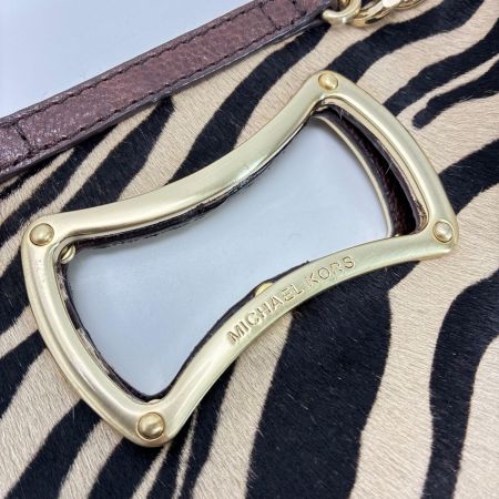 MICHAEL KORS マイケルコース クラッチバッグ カーフレザー 30F71SGC1H タイガー レディース ゴールド金具 保存袋有