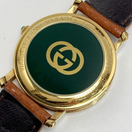  GUCCI グッチ ローマン文字盤 デイト 7200M ホワイト クォーツ メンズ 腕時計