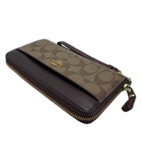  COACH コーチ シグネチャー ストラップ付 F87886 ブラウン×パープル ラウンドファスナー財布 レディース