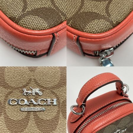 COACH コーチ エヴァ フォーン クロスボディ シグネチャー ベージュ×ピンク系 フォンウォレット ショルダーバッグ