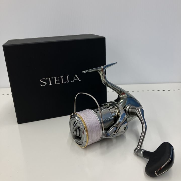 σσ SHIMANO シマノ SHIMANO 03810 18ステラ 4000MHG 箱有り 替えハンドル有 リールスタンド付き 03810  純正ハンドルキャップ無 リールスタンド付き｜中古｜なんでもリサイクルビッグバン