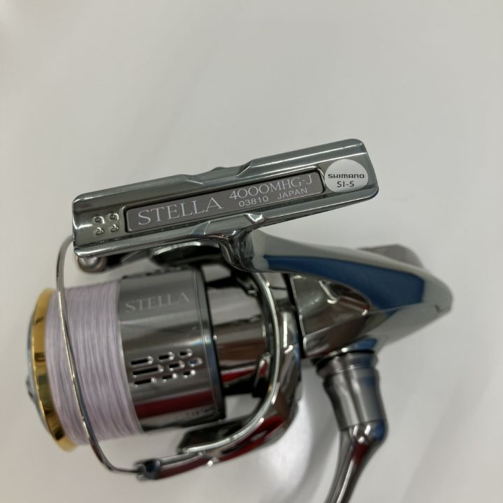 σσ SHIMANO シマノ SHIMANO 03810 18ステラ 4000MHG 箱有り 替えハンドル有 リールスタンド付き 03810  純正ハンドルキャップ無 リールスタンド付き｜中古｜なんでもリサイクルビッグバン